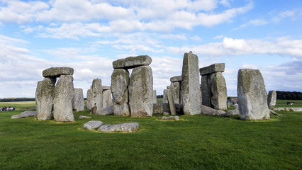 Obraz na płótnie Canvas Stonehenge prehistoric monument, blue sky and clouds - Wiltshire, Salisbury, England, UK