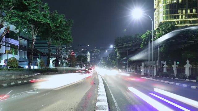 JAKARTA, Indonesia. November 13, 2017: Time lapse footage of traffic at night in Jakarta highway. Shot in 4k resolution
