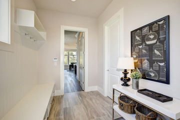 Pretty entrance foyer with an extra long built-in bench - obrazy, fototapety, plakaty