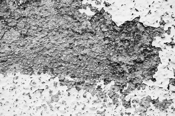 Paint flaking off a wall