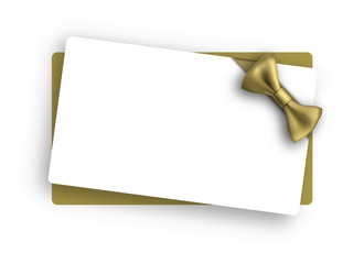 White holiday card with golden bow.
