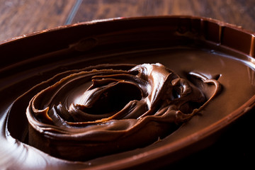 Sweet Dark Chocolate Cream in a brown  bowl.