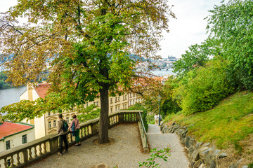 Downhill to the Vltava river from the Vysehrad fortress in Prague in the autumn, Czech Republic