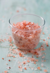 Himalayan Salt on turquoise wooden surface