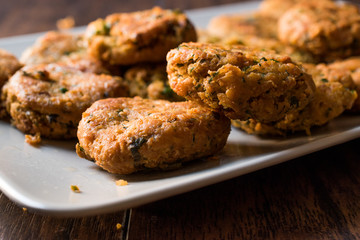 Fried Chickpeas Falafel on wooden surface.
