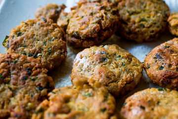 Fried Chickpeas Falafel on wooden surface.