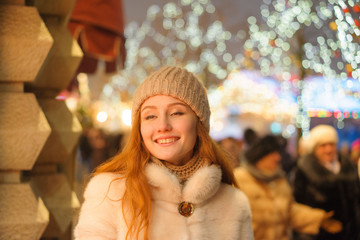 red-haired girl in christmas, outdoor