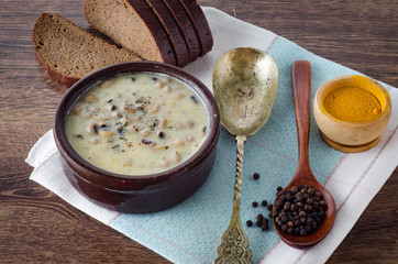 Mushroom soup served on the table