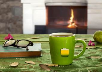 Obraz na płótnie Canvas green tea cup over table