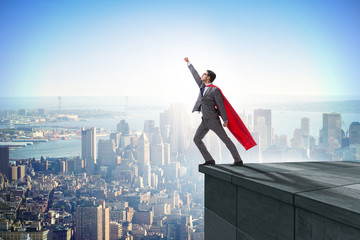 Businessman superhero successful in career ladder concept