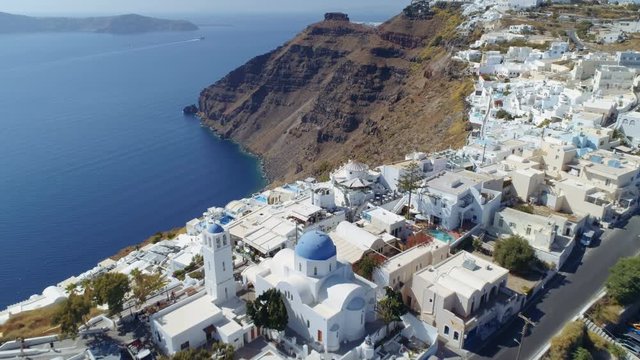 Aerial Shot Of Santorini Island, Greece. Above view of iconic white and blue buildings