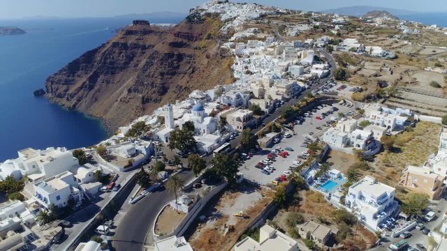 Aerial Shot Of Santorini Island, Greece. Iconic white and blue buildings on the cliff