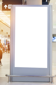 Blank billboard advertising panel in terminal airport, Mock up white screen, insert for text of customer. Space for texting in products or promotional at airport,train station,advertising public