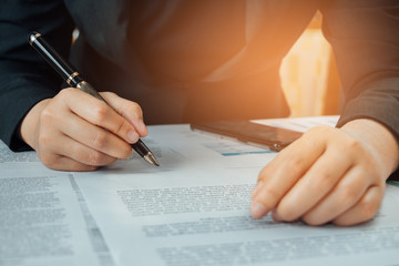Businesswoman signing terms and agreement documents contract, business signing concept