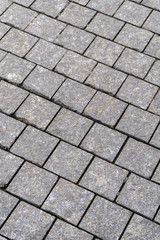 Stone tiles pavement texture. Footpaths pavement in park.