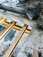 Residential buildings cunstruction place. Formwork with a concrete poured