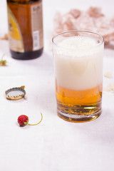 Glass with beer on the table