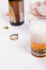 Glass with beer on the table