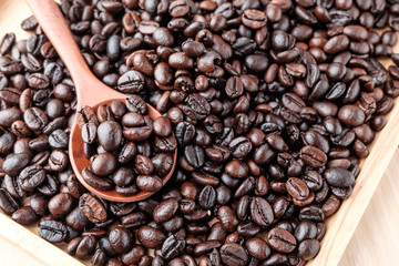 coffee beans on wooden background