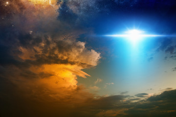 Extraterrestrial aliens spaceship in red glowing sunset sky © IgorZh
