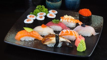 japanese cuisine. sushi set on the background