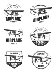 Light airplane related emblems. Set of vintage airplane emblems, badges and icons. Isolated lite airplane side view. - obrazy, fototapety, plakaty