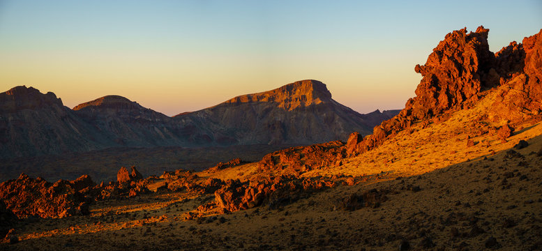 rocks on the Teide volcano in the light of the rising sun © Mike Mareen