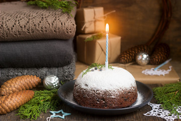 Obraz na płótnie Canvas Christmas cake or pudding in festive decoration.