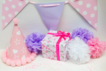 Present and decorations for surprise birthday party of little girl