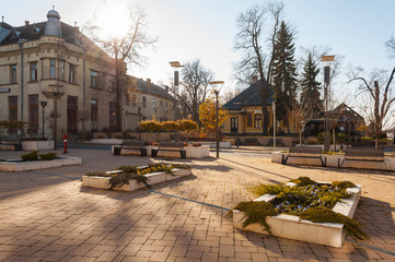 Naklejka premium Balassagyarmat, Pest / Hungary - November 15 2017: street, park, city hall in autumn, daylight town everyday life
