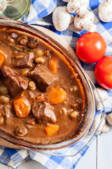 Beef Bourguignon stew in a casserole dish