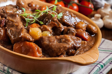 Beef Bourguignon stew served with baguette