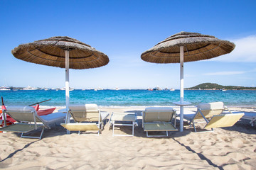 Straw umbrellas on the beach