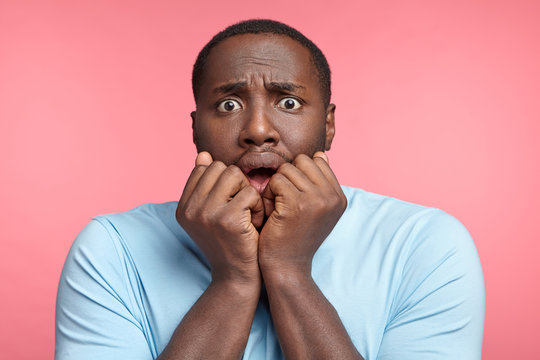 Scared black man face. Stock Photo