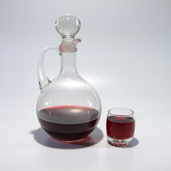 Glass decanter with alcohol.