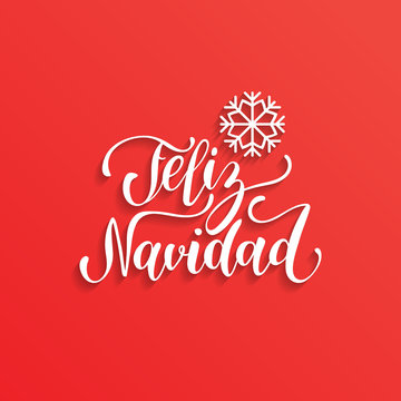 Feliz Navidad translated from Spanish Merry Christmas handwritten lettering with snowflake illustration.