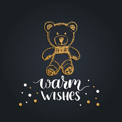 Warm Wishes lettering on black background. Vector hand drawn Christmas illustration of toy plush bear.