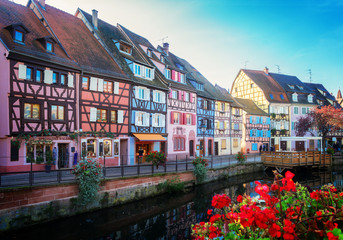 view of canal and houses over it, Colmar, most famous town of Alsace, France, retro toned