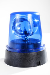 Police strobe studio photo. Emergency Light blue, spinning beacon. Glowing siren for cars. Fire protection signs. Isolated on white background. Blue.
