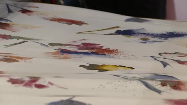 wallpaper in a roll on a drawing machine
