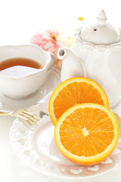 Orange and tea for dessert image