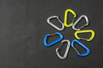 Different colors of climbing carabiners.