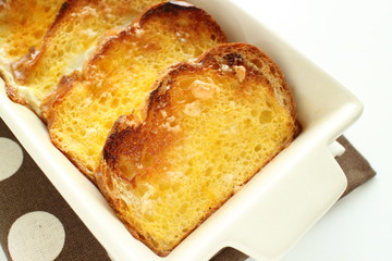 bread pudding on white background for homemade dessert image