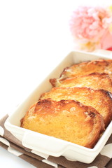bread pudding on white background for homemade dessert image