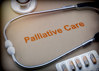 Palliative care, stethoscope and blister pills, conceptual image - obrazy, fototapety, plakaty