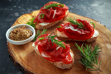 salted bresaola beef, Italian bruschetta with soft chees, onions, whole grain mustard, chillies and...