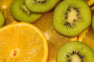 Background of the kiwi and orange fruits