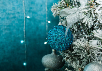 christmas tree decoration on blue background with copy space.