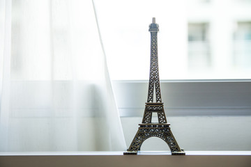 Eifel Tower Model with white curtain
