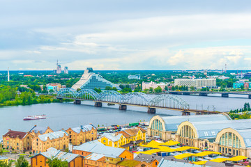 Aerial view of Riga including the Latvian national library and the zeppelin hangars from top of the academy of sciences building. © dudlajzov